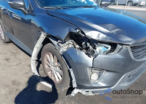 2016 Mazda Cx-5 Touring z USA, uszkodzony, nr VIN JM3KE2CY5G0889323